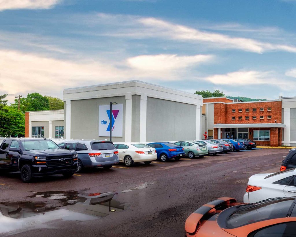 The Sunbury YMCA building with a lot of cars