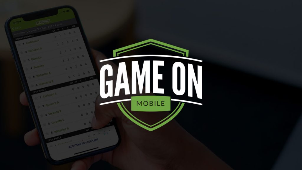 Game on mobile with a phone in the background