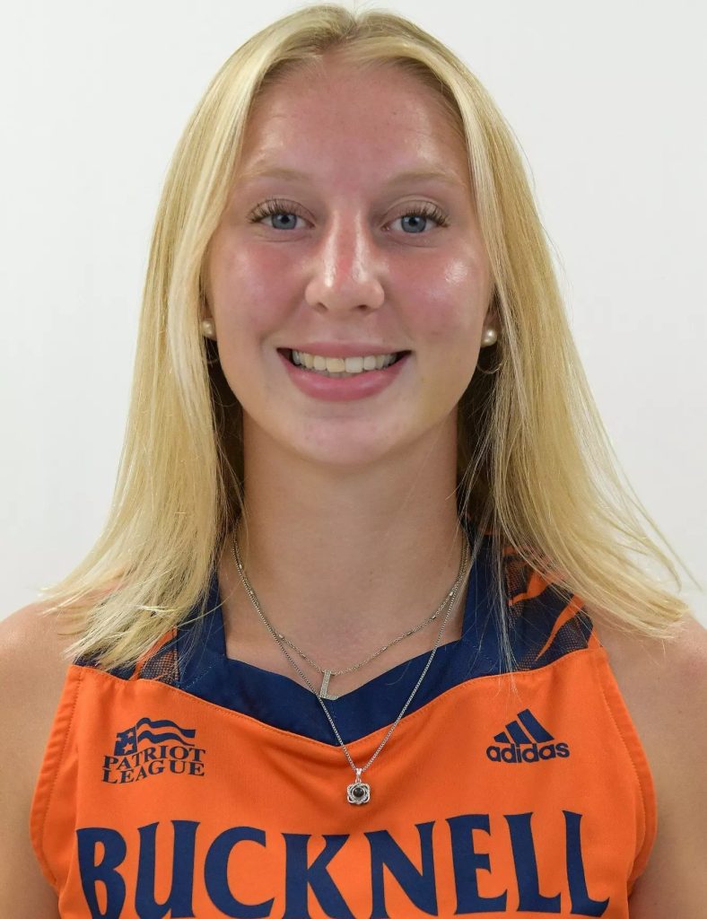 Coach Lindsey Fogelsanger headshot - in a Bucknell pinnie - roster photo