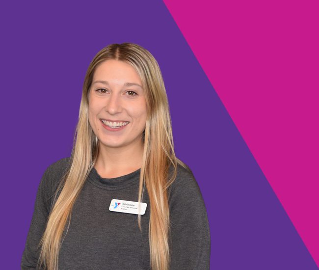 Headshot of personal trainer Olivia on purple and pink background