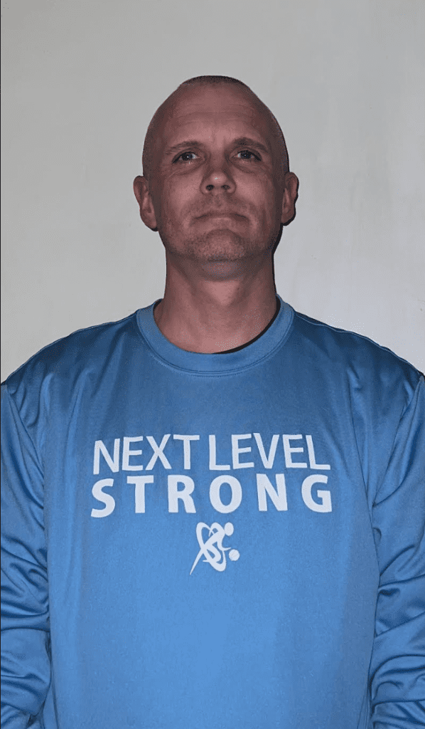 Headshot of coach JT Marnon