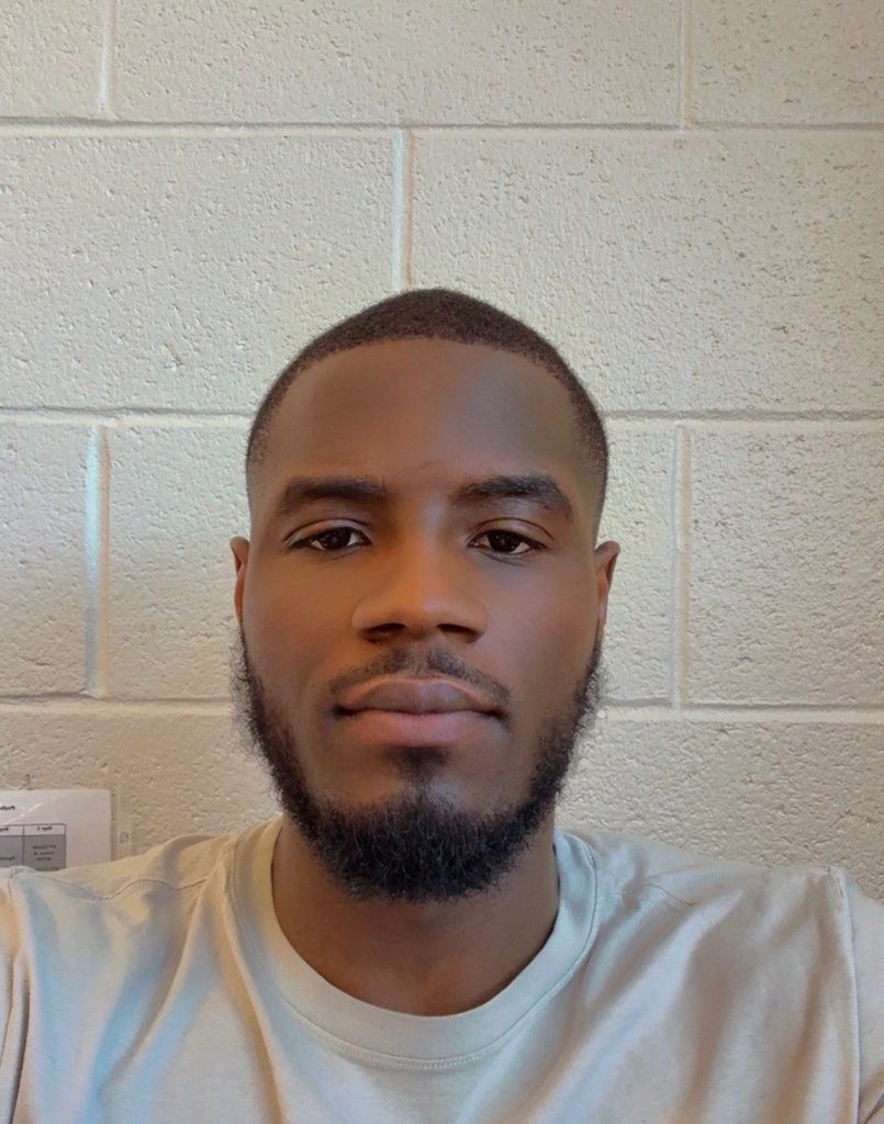 Headshot of coach Dezz Henderson